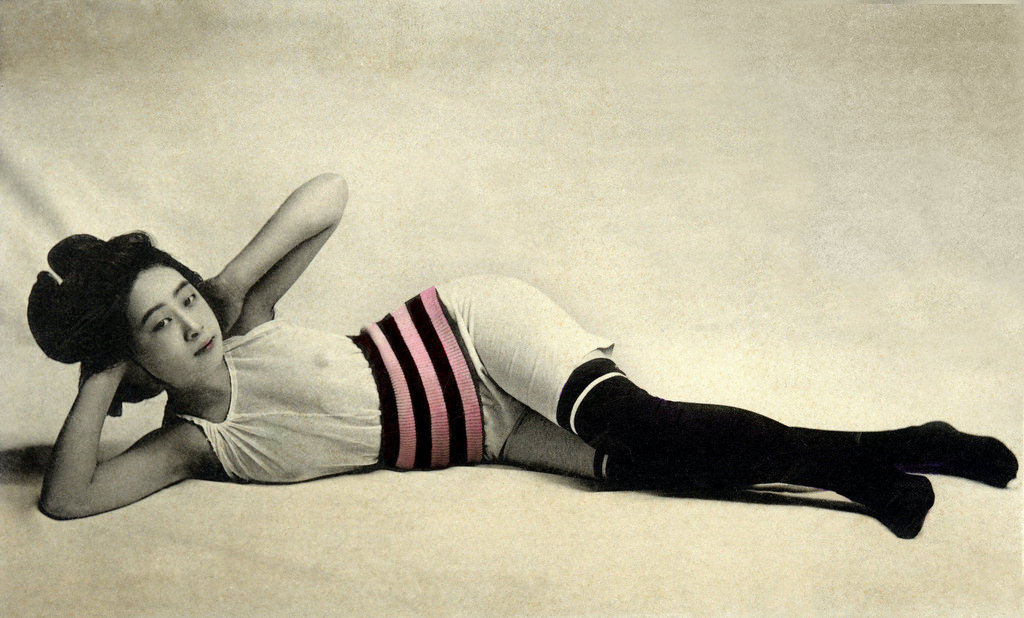 Geisha wearing swimsuit with black stockings, 1933
