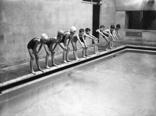 embers of the Pioneer Health Centre in Peckham, south London, learn how to swim on November 19, 1935