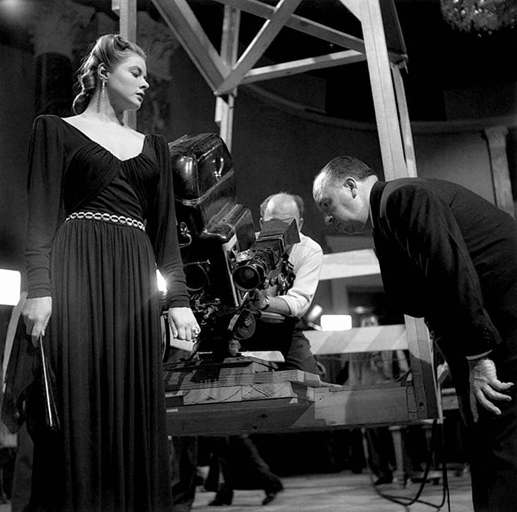 Alfred Hitchcock, Ingrid Bergman and cinematographer Ted Tetzlaff during the filming of “Notorious” at RKO Pictures’ studio in Culver City, California, 1946