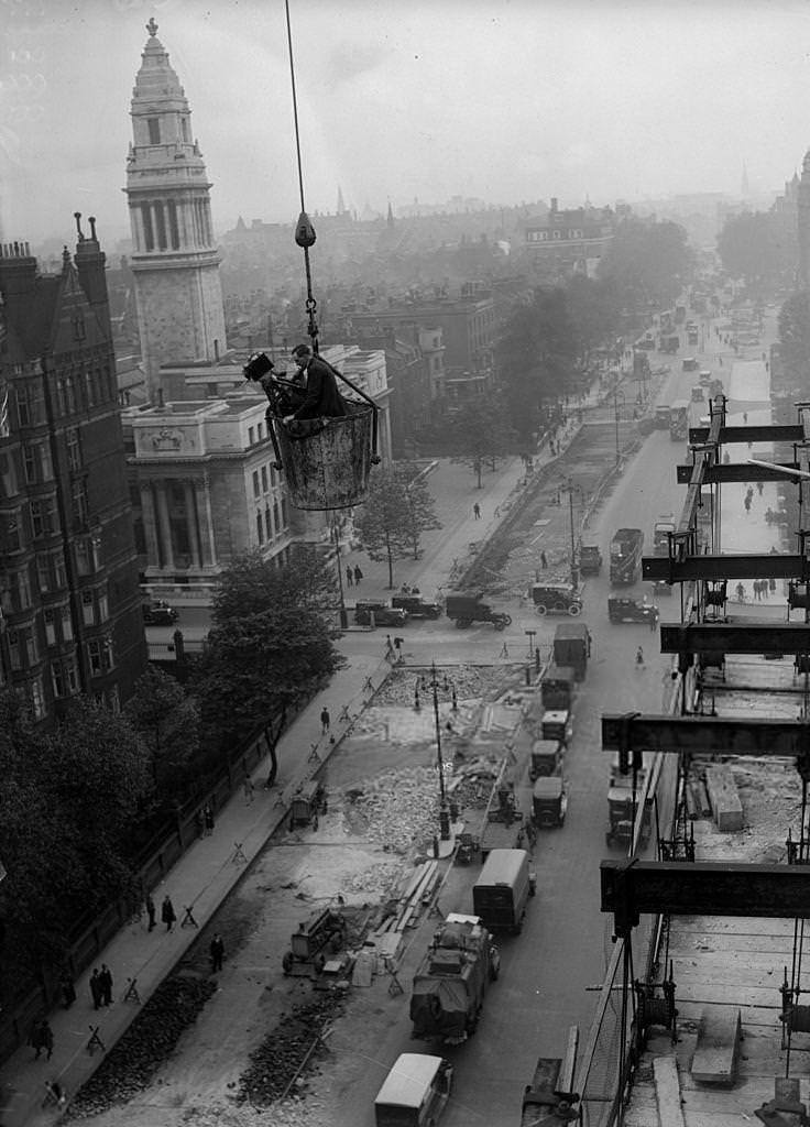 A cameraman filming over Baker Street, London in 1930