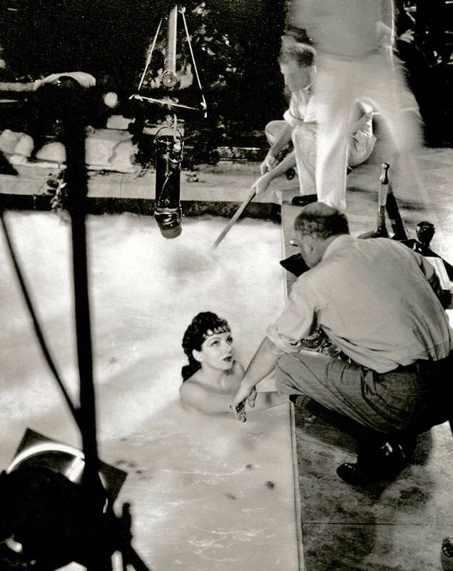 Claudette Colbert and director Cecil B. DeMille during the making of “The Sign of the Cross”, 1932