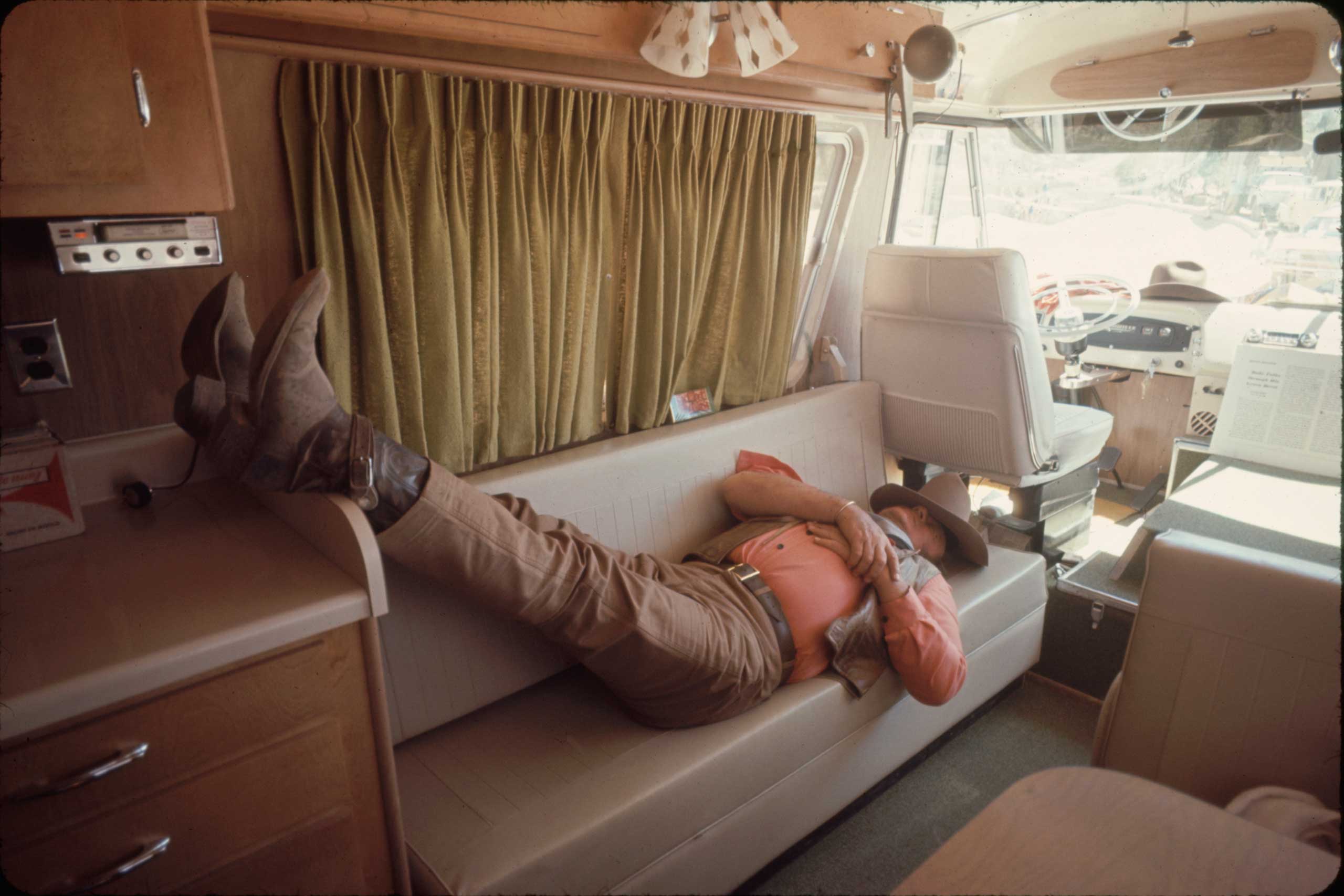John Wayne takes a break during the filming of 'The Undefeated', 1969