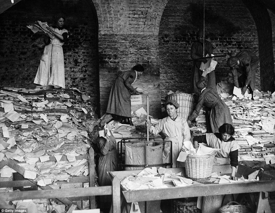 The paper, as this photo taken on the 16th April 1917 shows, then had to be sorted into piles and stored.