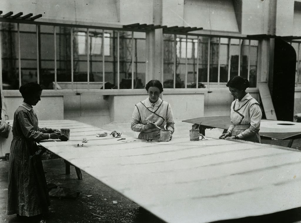 Women taping planes