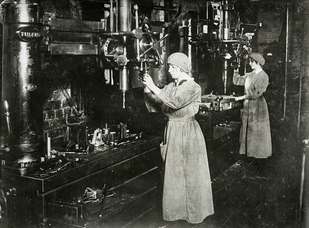 Women operating radial drills, drilling valve covers and strainer plates for weed boxes for marine engines