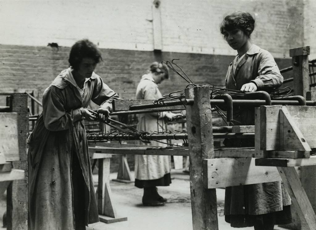 Workers preparing for the construction of concrete ships