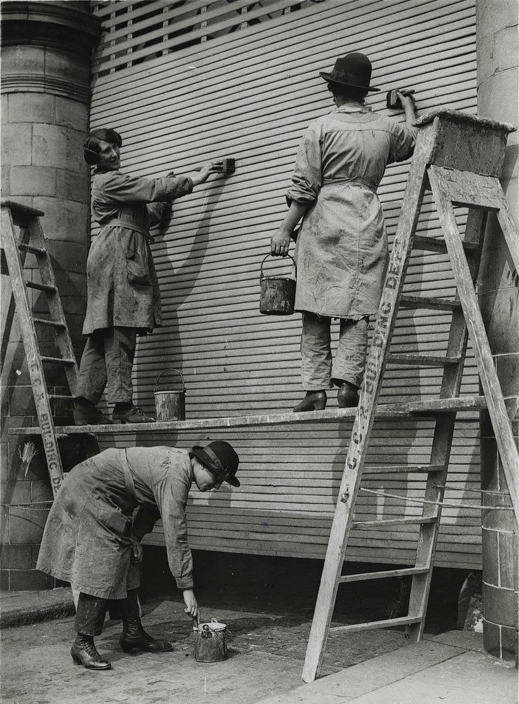 Women railway workers painting and decorating