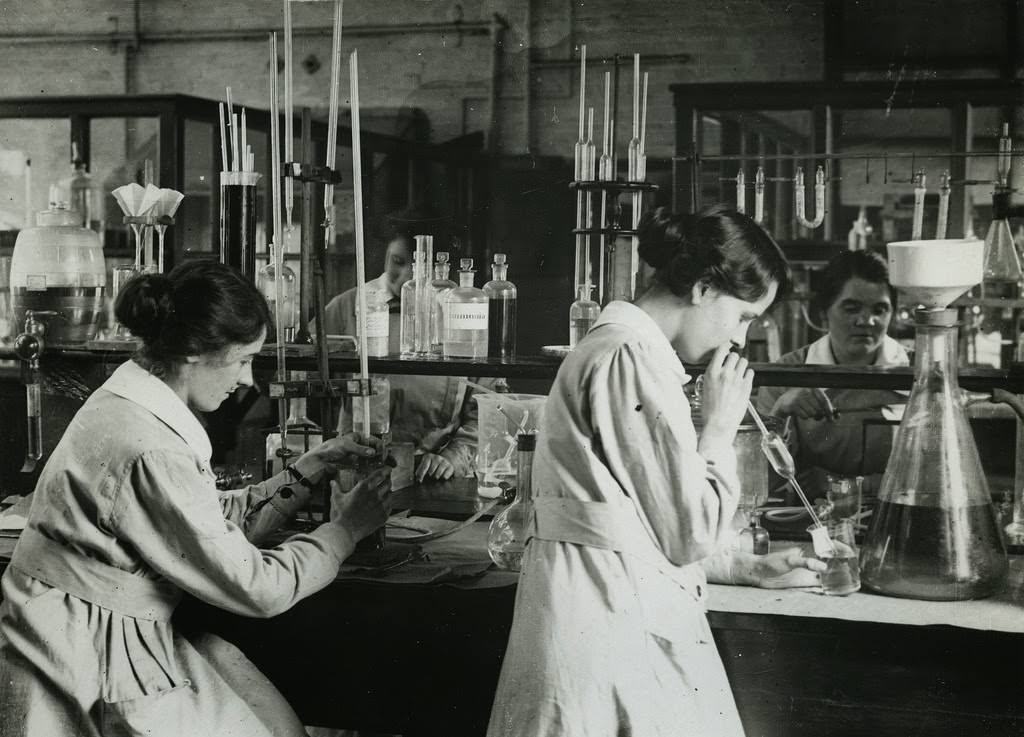 British women working in chemical laboratory near Manchester