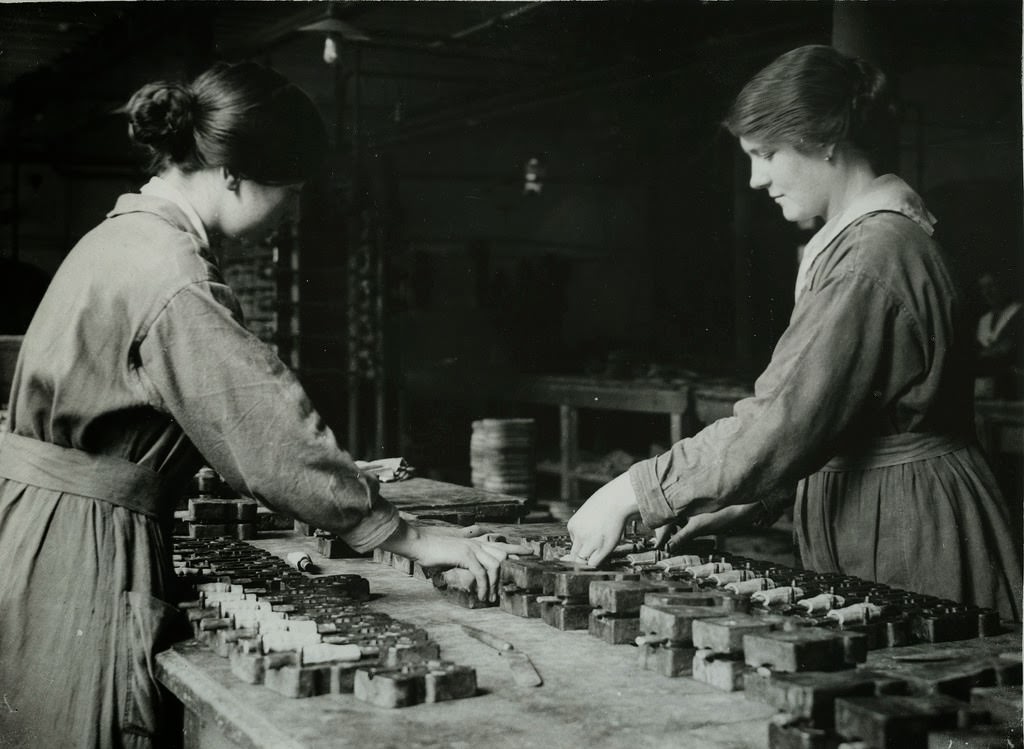 British women rubber workers in Lancashire making mouth-pieces for gas masks