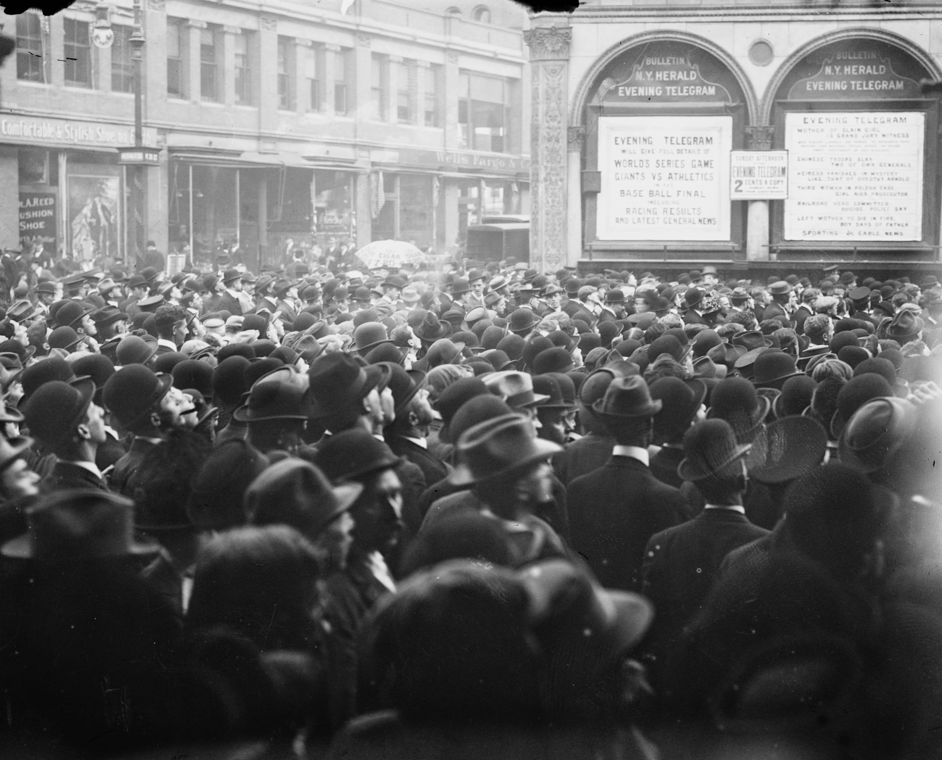 Baseball fans congregate outside the New York Herald Building during the 1911 World Series