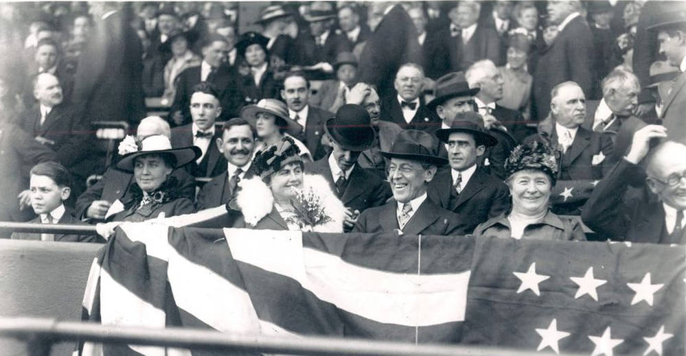 President Woodrow Wilson with his wife Edith at opening day , 1916