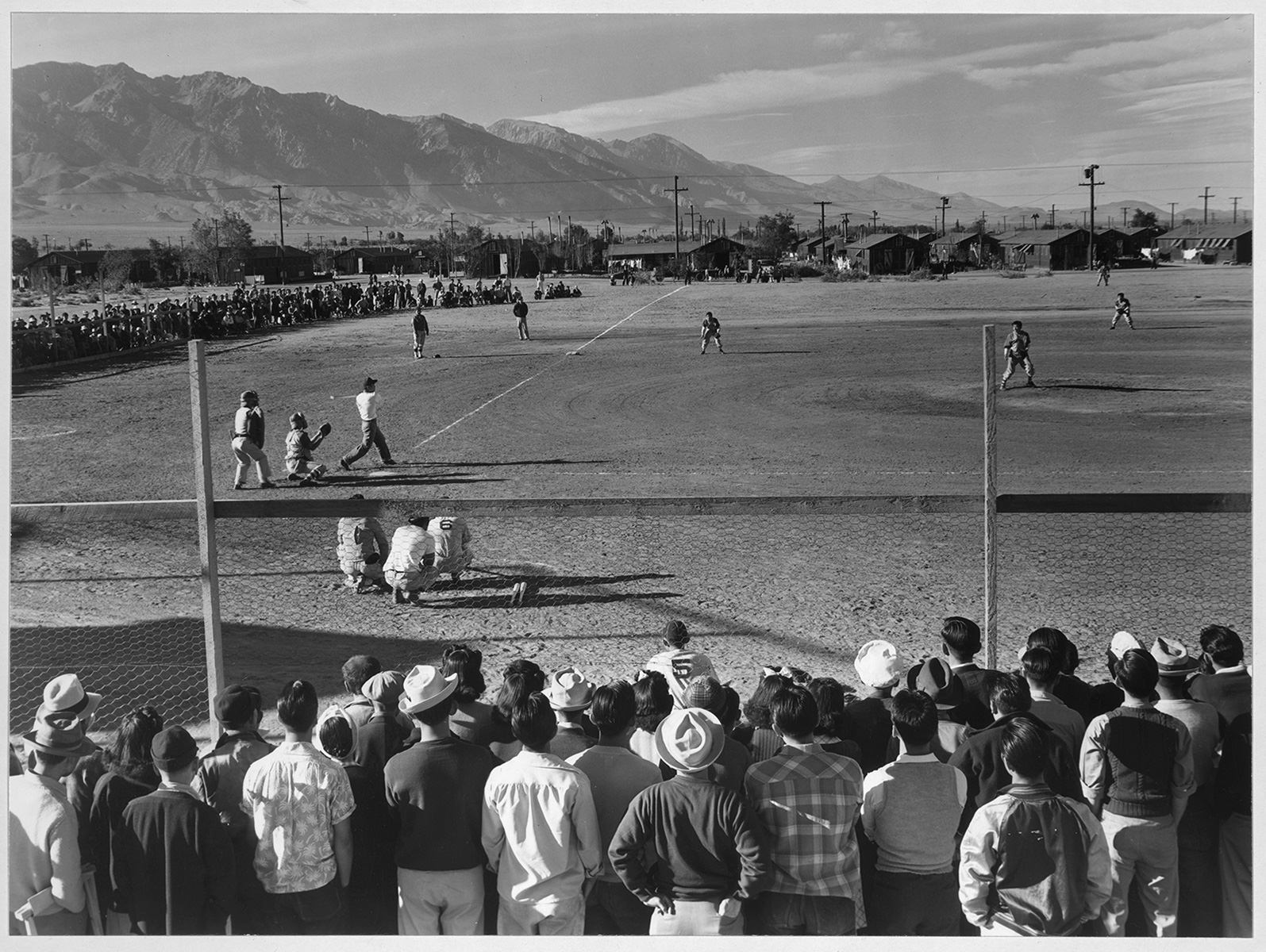 An Ansel Adams photo of baseball at Manazar Relocation Center in 1943