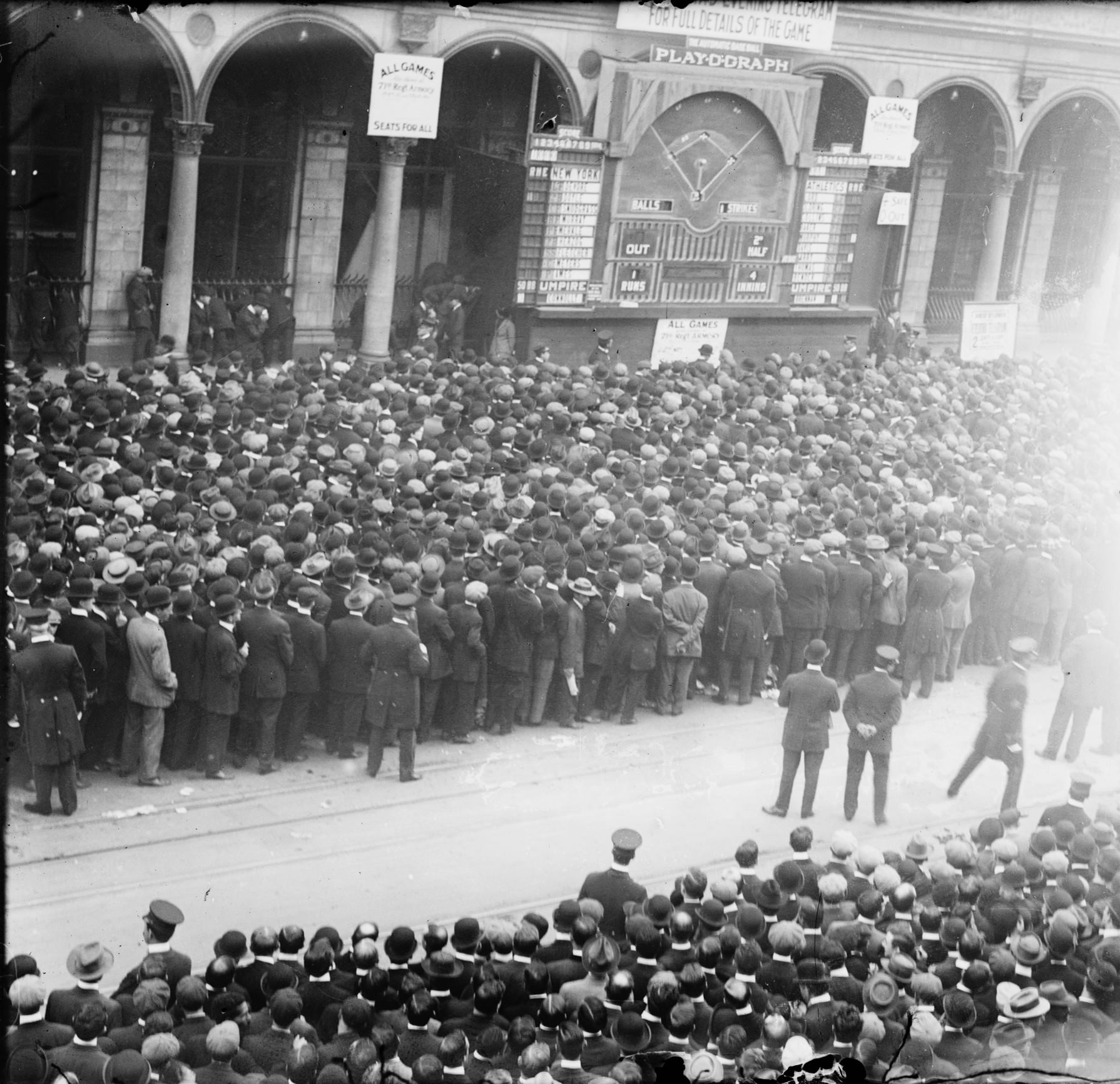 People watching scores on Play-O-Graph outside The New York Herald Building in 1911 World Series