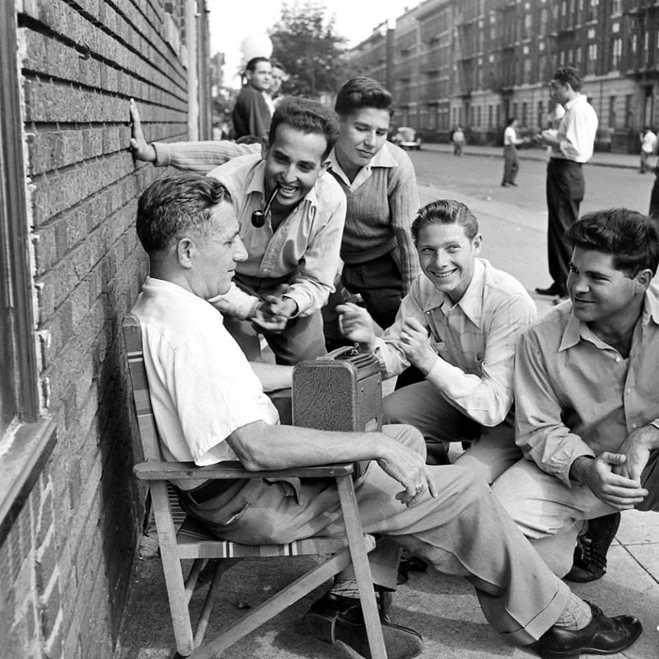 Listening to a Dodgers-Giants ballgame on the radio, Brooklyn, New York 1946.