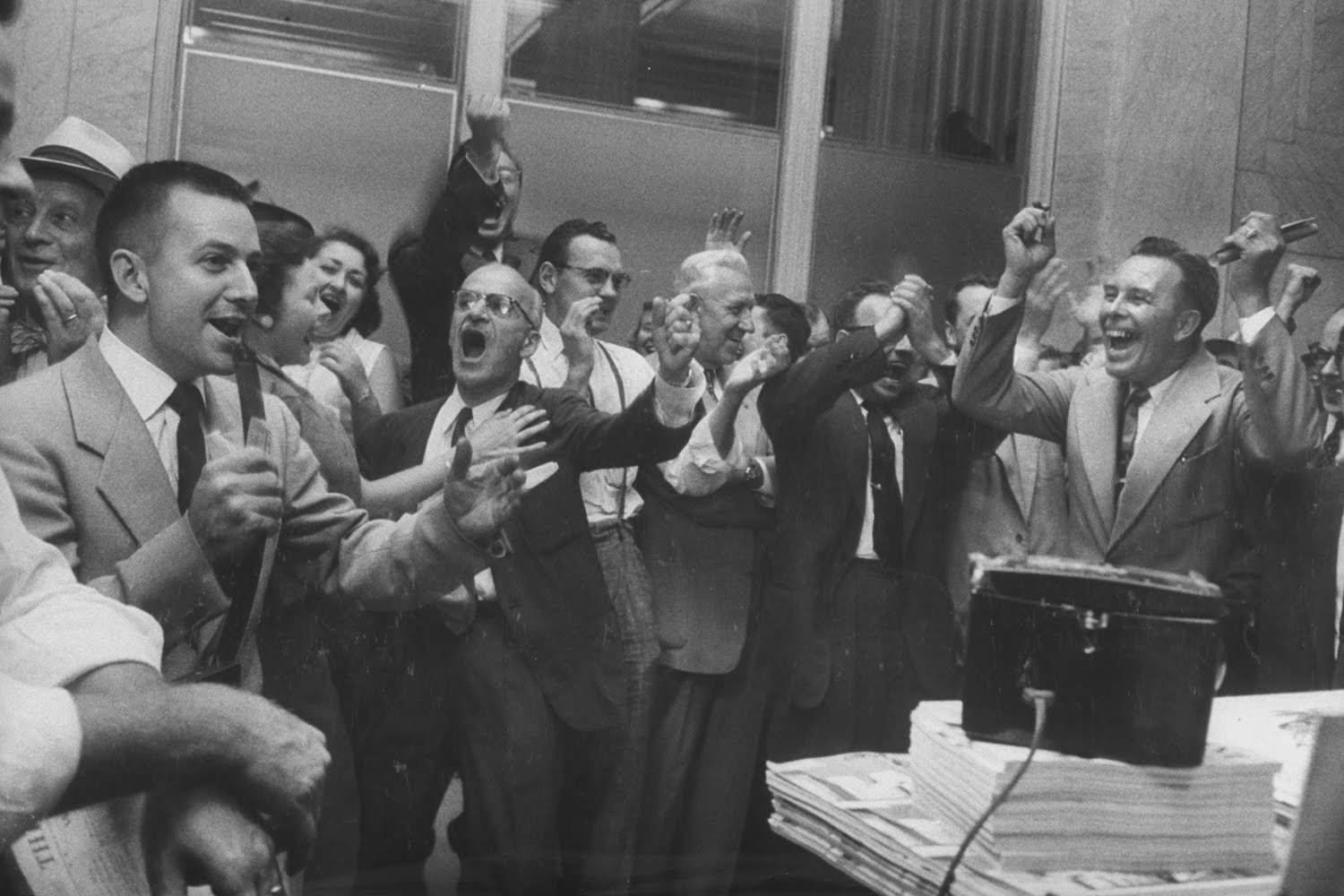 Milwaukee Braves fans listen to a game against the Dodgers in 1956