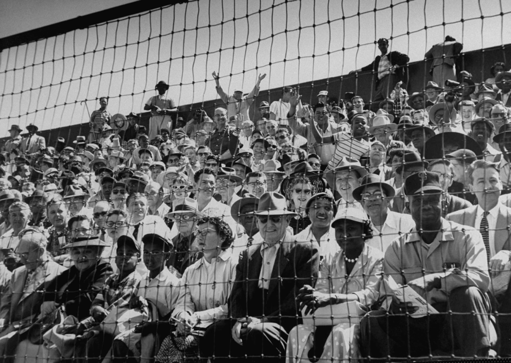 Baseball fans during the opening game between the San Francisco Giants and Los Angeles Dodgers in 1958