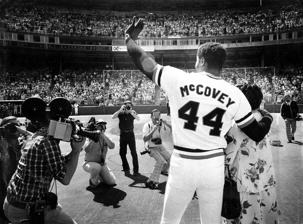 Giants first baseman Willie McCovey waves to fans as he's honored at Candlestick Park in 1977.