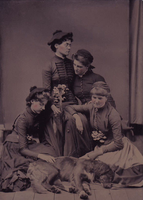 Four girls mourning a dead dog