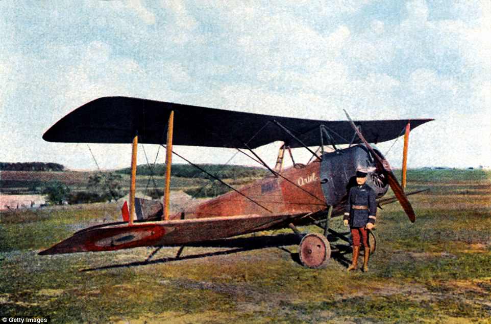 French Captain Robert de Beauchamp stands alongside his British Sopwith fighter in September 1916