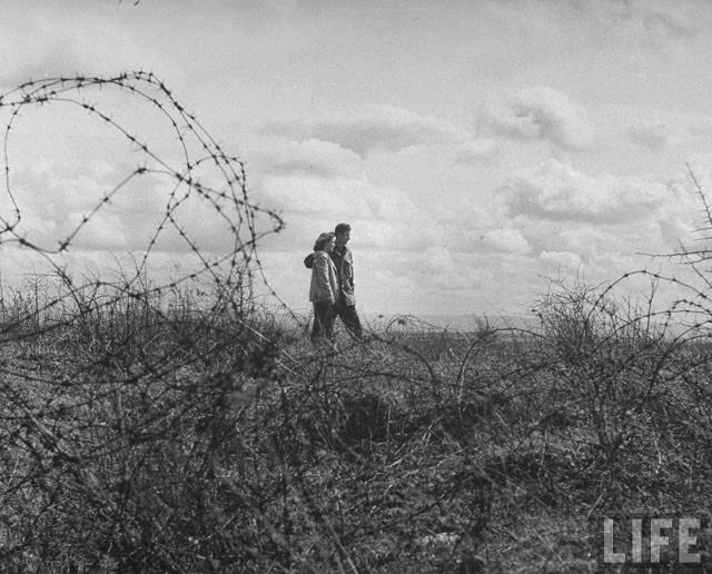 Ernest Kreiling and his bride touring battlefield where he took his first prisoner during WWII.