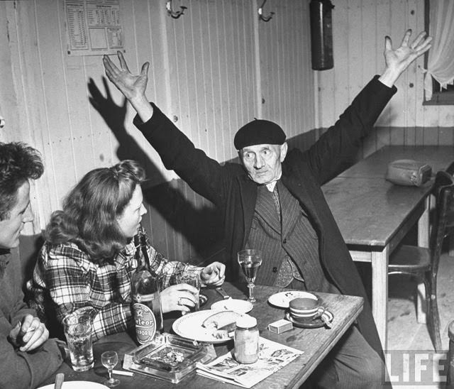 Ernest Kreiling and his bride talking with elderly Frenchman.