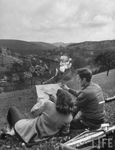 Ernest Kreiling and his bride overlooking valley where he fought during WWII.