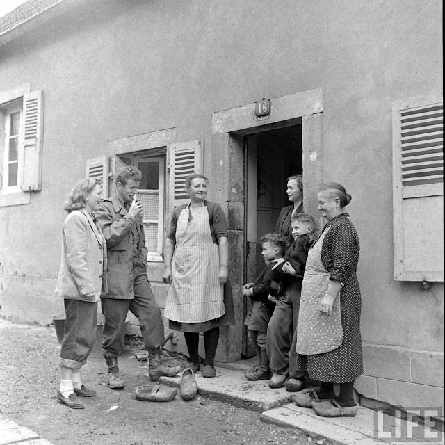 Ernest Kreiling and his bride talking to local community.