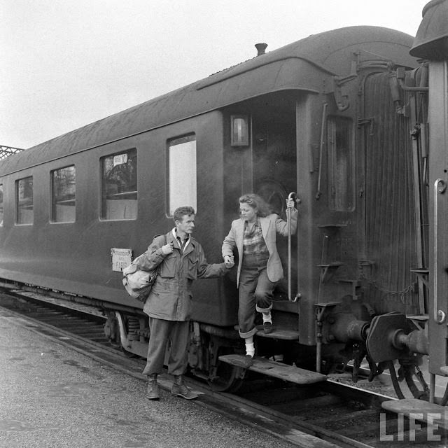 Ernest Kreiling and his bride getting off from train.