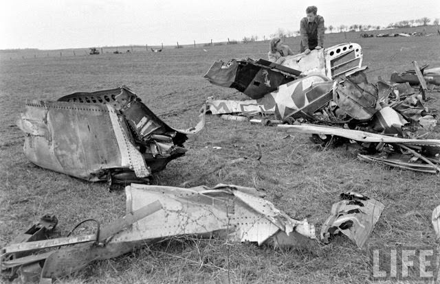 Ernest Kreiling and his bride watching debris of plane.