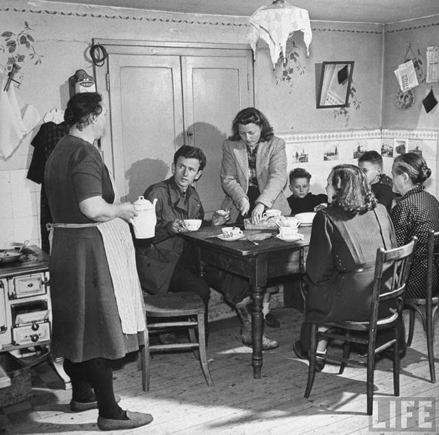 Ernest Kreiling and his bride visiting with French family he met during WWII.