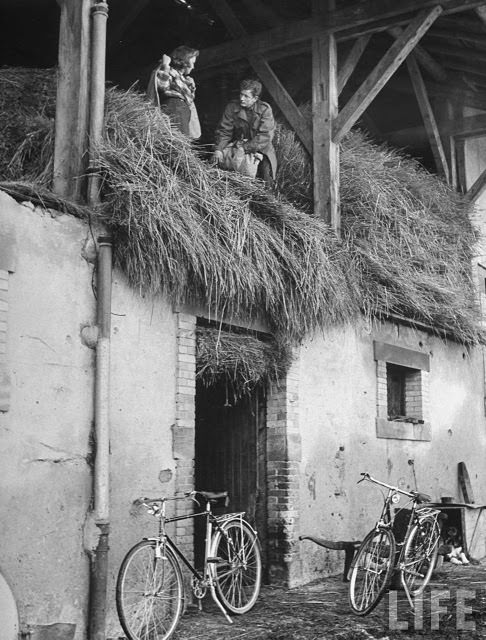 Ernest Kreiling showing his bride the hayloft where he spent Thanksgiving 1944.