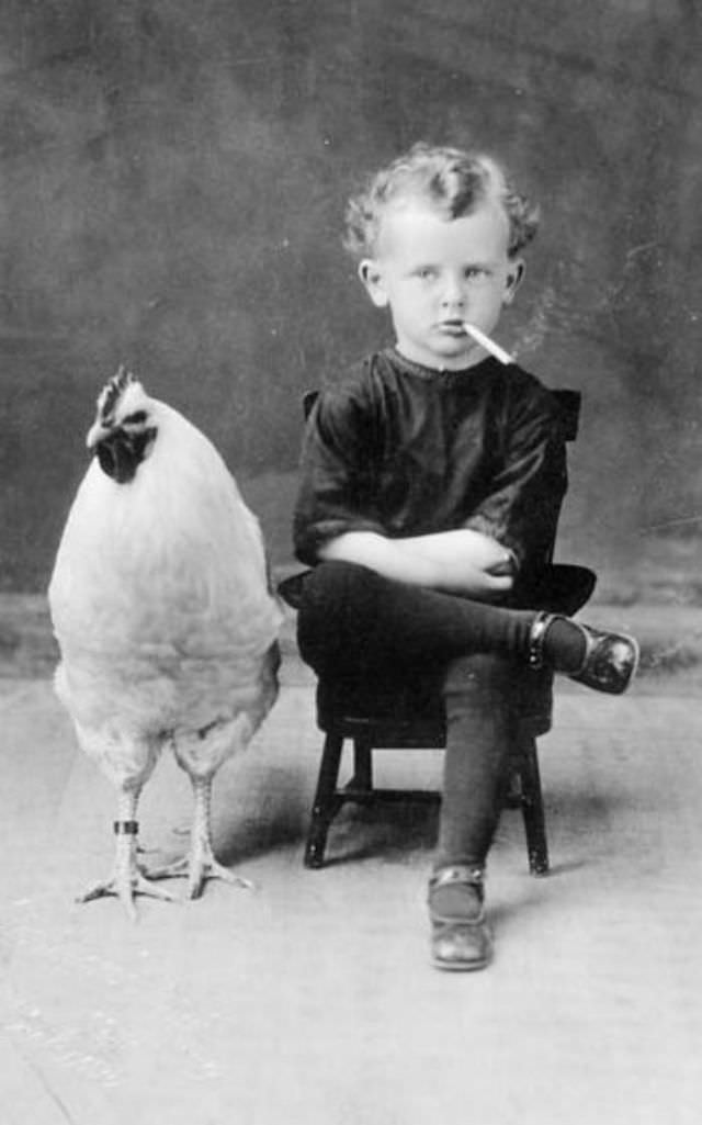 Portrait of Henri Groulx and his rooster, 1920