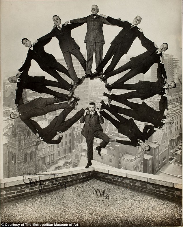 Man on Rooftop with Eleven Men in Formation on His Shoulders, 1930