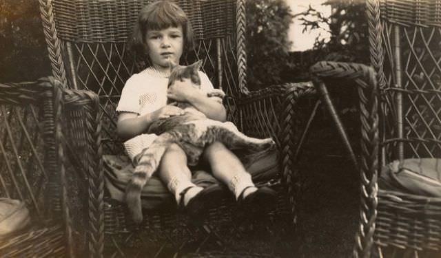 Girl Sitting With Cat