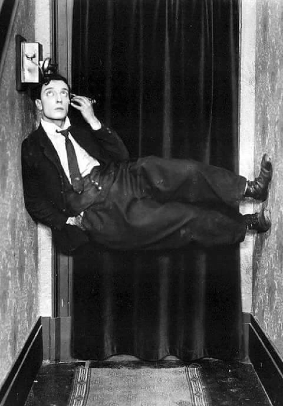 Buster Keaton, on the telephone
