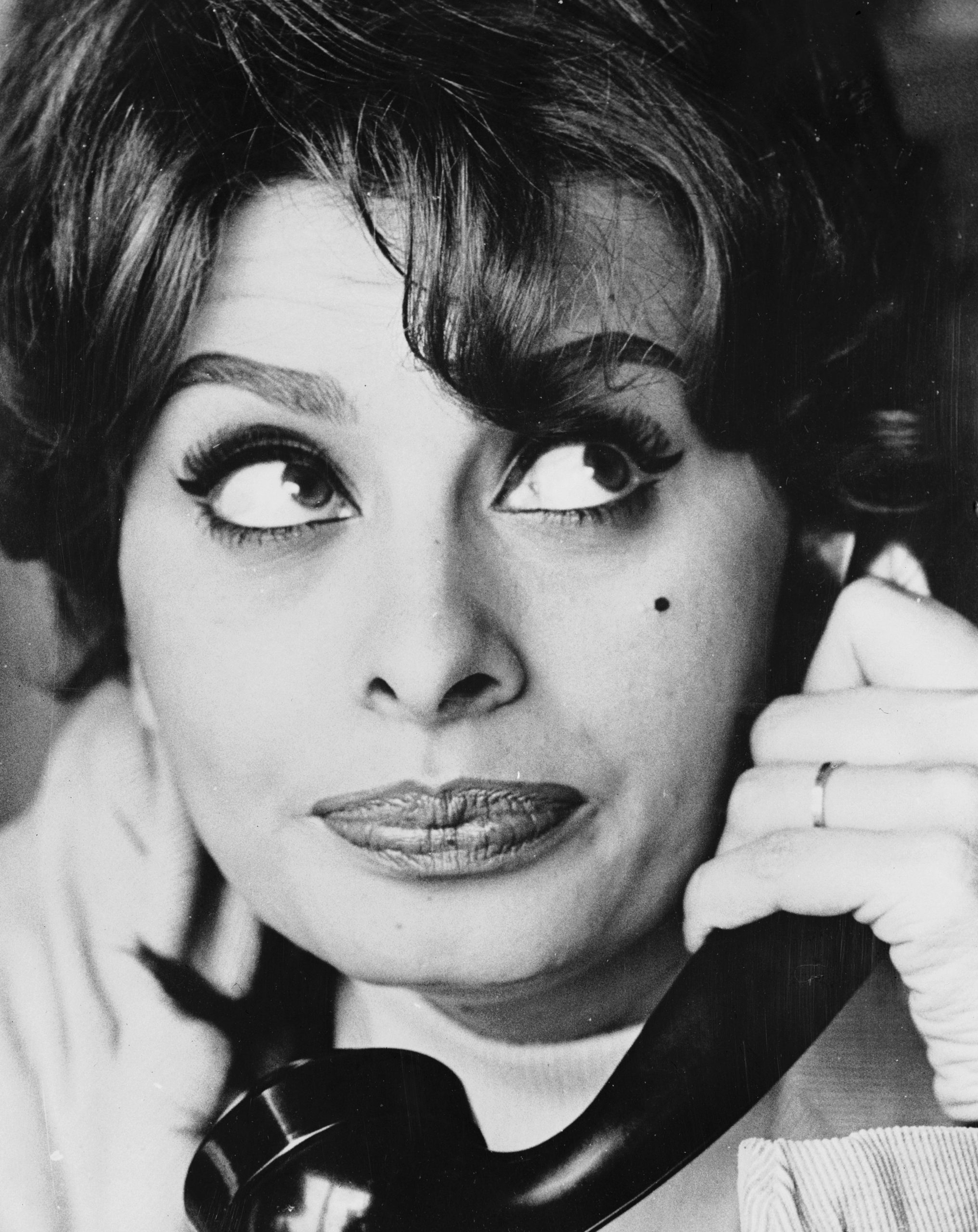 Sophia Loren, on the telephone