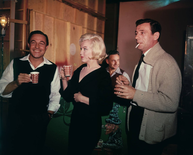 Marilyn Monroe with Gene Kelly and Yves Montand on the set of Let’s Make Love, 1960
