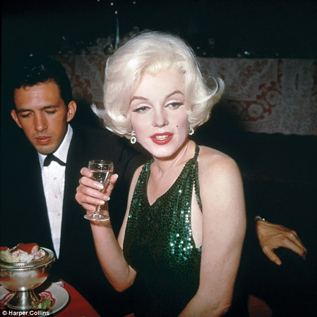 Marilyn with her date and boyfriend Mexican screenwriter Jose Bolanos at the Golden Globe Awards on March 5, 1962