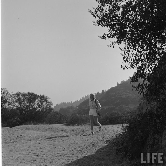 Marilyn Monroe Hiking in woods, 1950