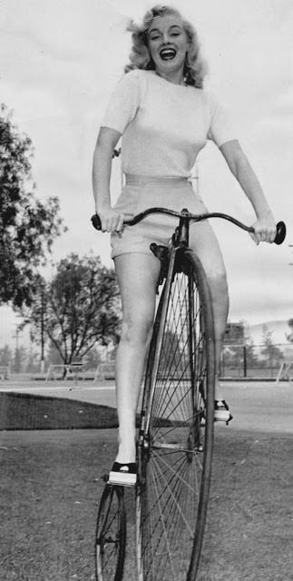 Marilyn Monroe on a penny-farthing bike in 1949