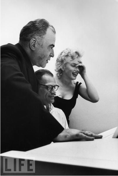 Marilyn and Arthur Miller Entertaining a guest, 1958