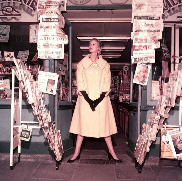 Carmen Dell' Orefice wearing coat by Jacques Fath, 1954.