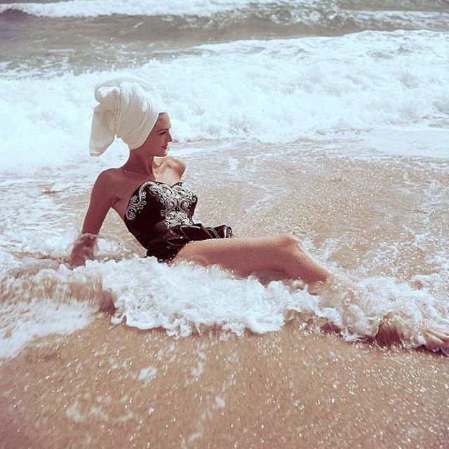 Carmen Dell' Orefice, at Manalapan Beach, Florida, 1954.