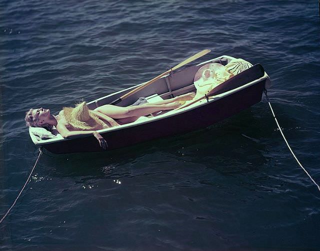 Carmen Dell' Orefice, at Manalapan Beach, Florida, 1954.