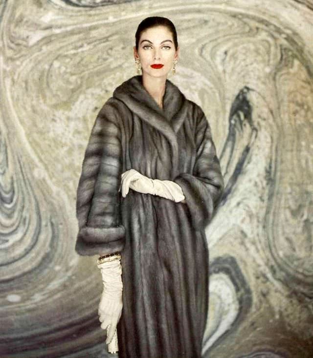 Carmen Dell' Orefice in Lutetia EMBA min coat by Alixandre for Samuel Schulman Furs, Inc., jewelry by Cartier,1957.