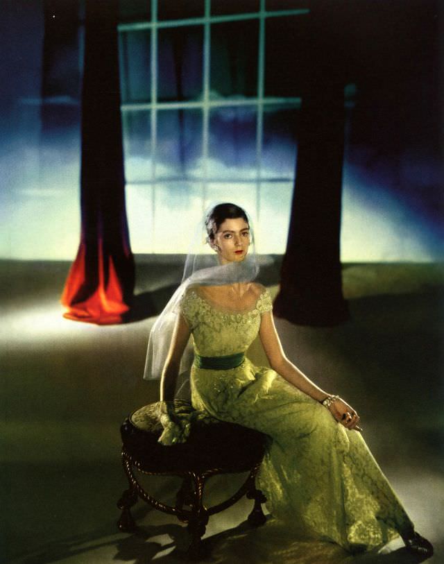 Carmen Dell' Orefice in lace dress by Hattie Carnegie, 1947.