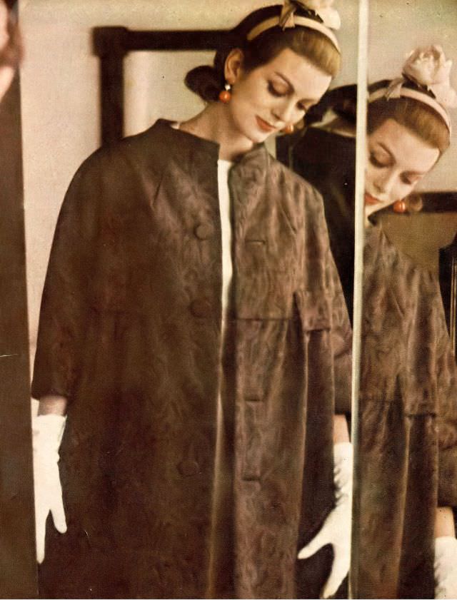 Carmen in brown moiré coat by Arthur Jablow, ecru rose hat by Madcaps, 1959.