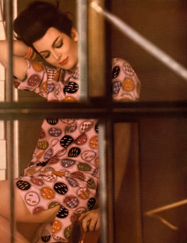 Carmen in cotton and Arnel beach shirt in colorful print medallions inspired by East Indian playing cards, 1959.