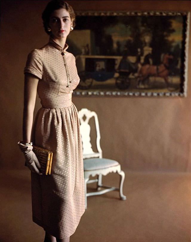 Carmen Dell' Orefice in beige silk jacquard dress,1948.