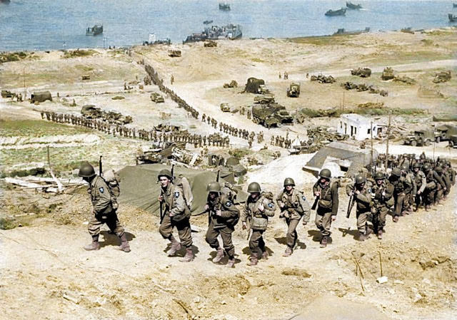 Reinforcements arrive by sea to bolster U.S. troop numbers on the Normandy front.
